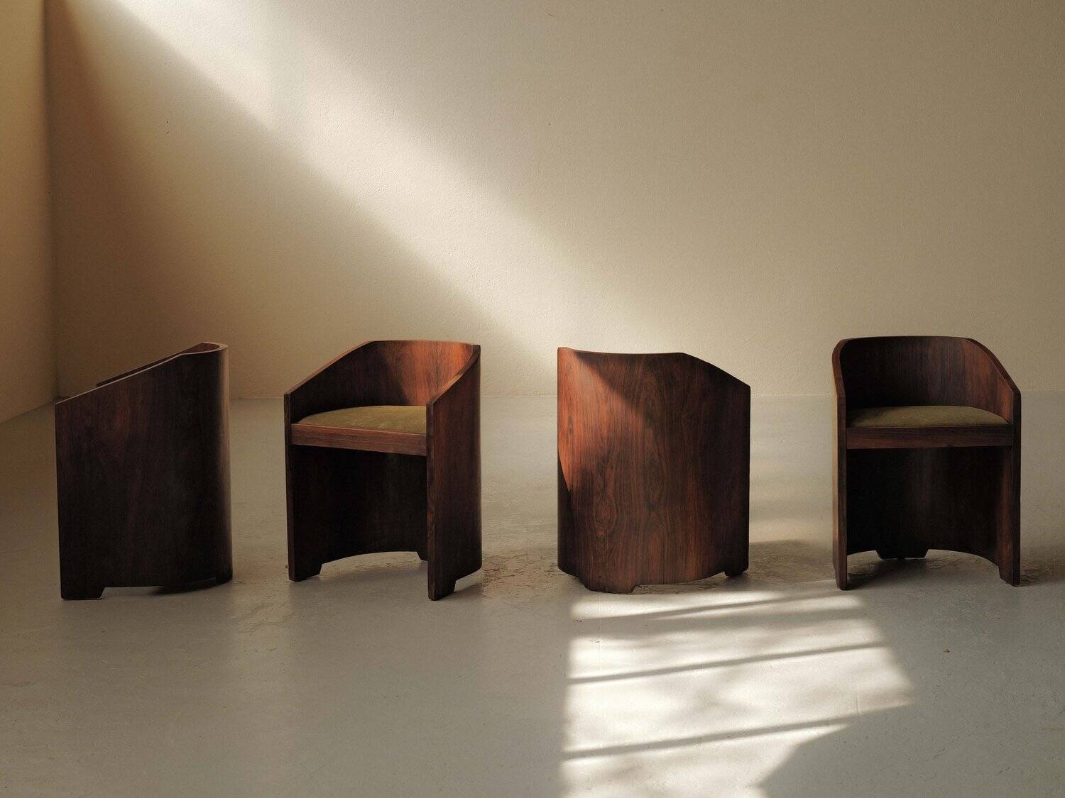 Set of 4 Art Deco armchairs in rosewood veneer, circa 1930.