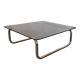Chrome tubular metal and smoked glass coffee table