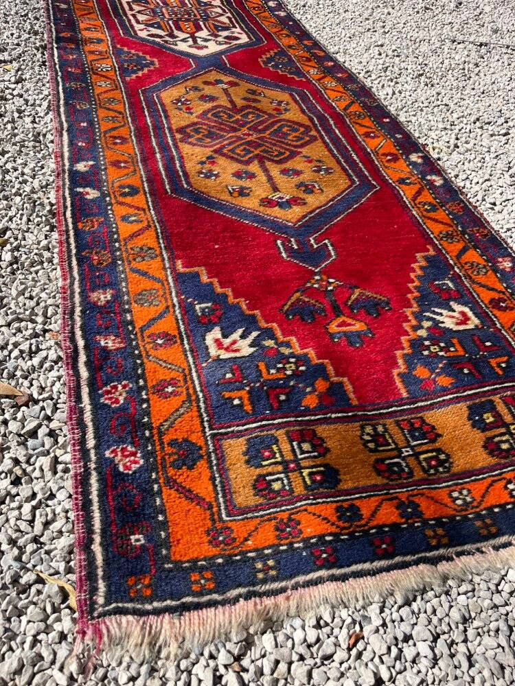 Long antique Persian carpet