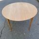 Table à manger scandinave ronde extensible décapée en teck brut 1950