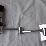 Wall lamp with articulated arm