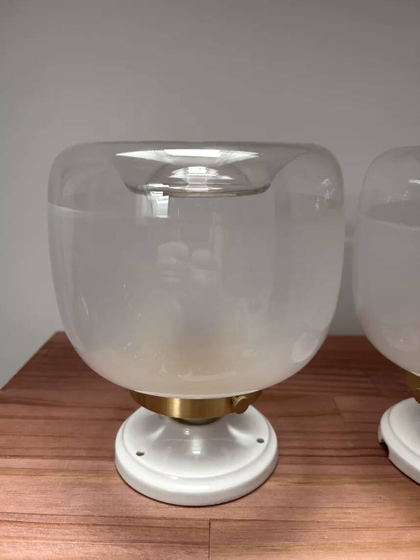 Pair of two-tone globe wall lights