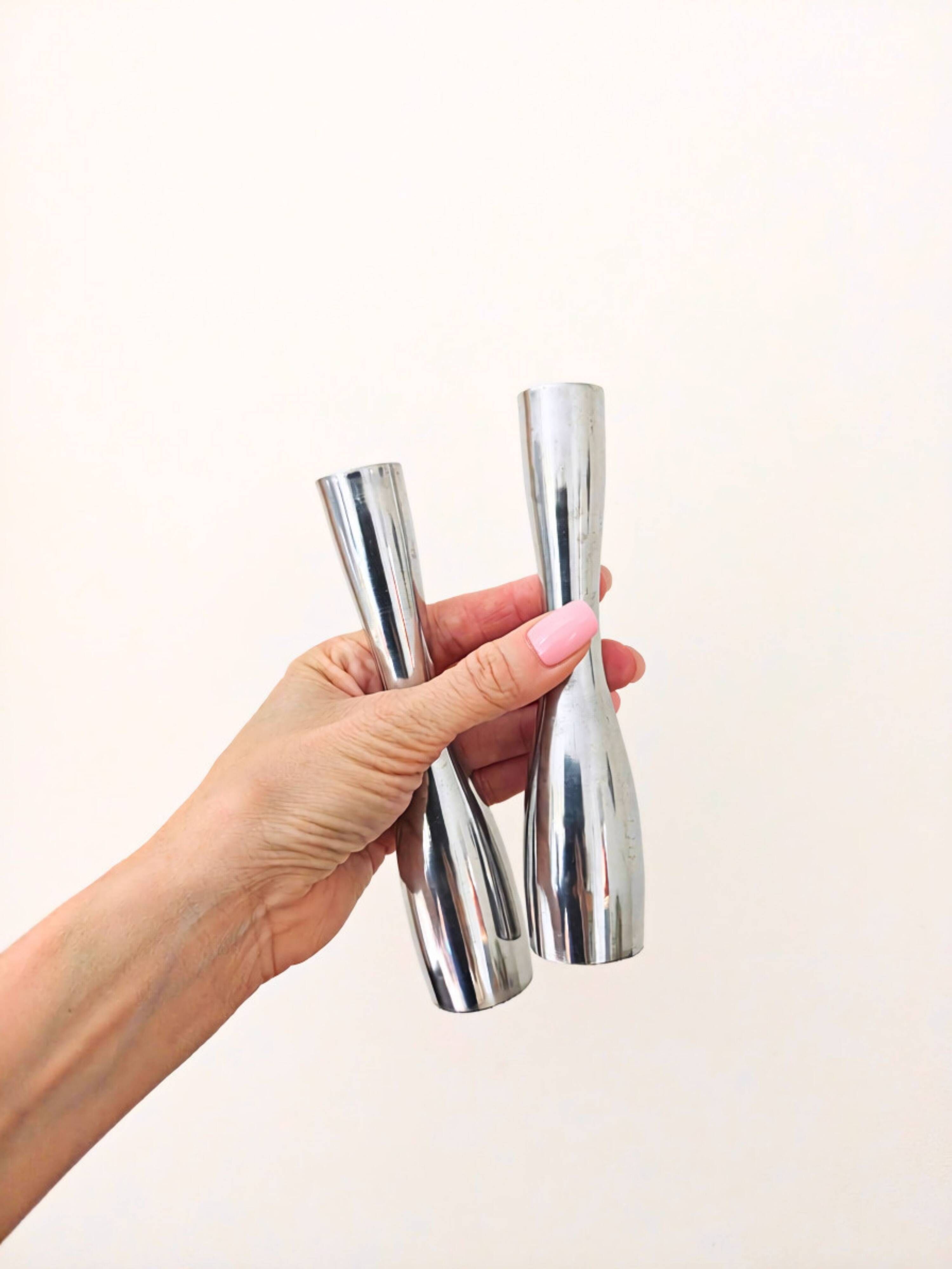 Pair of minimalist aluminium candlesticks in the style of Erika Pekkar.