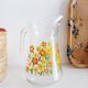 Carafe en verre à décor floral, années 70