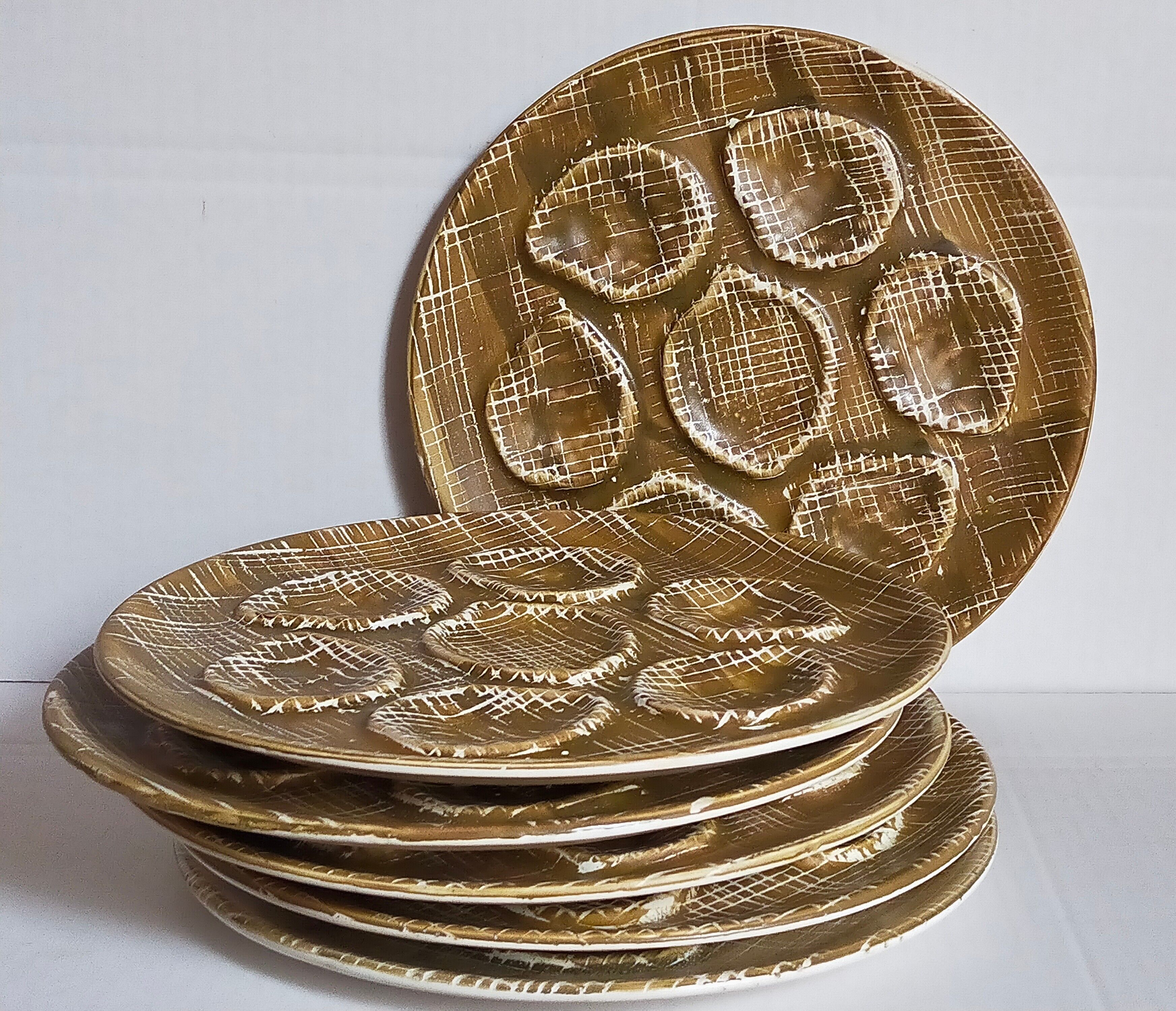Six oyster plates earthenware with matte enamel, 50s