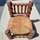 Low chair 50s oak and straw by the fire