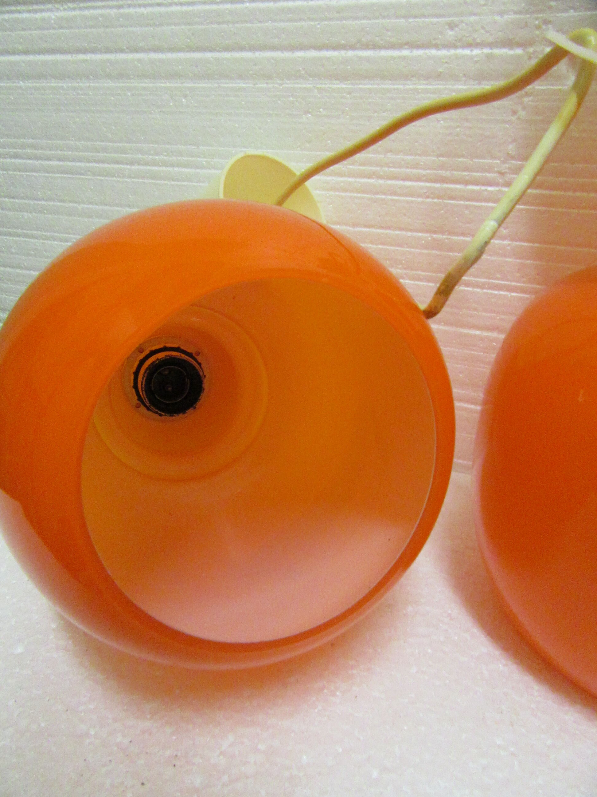 Pair vintage orange hanging lamps