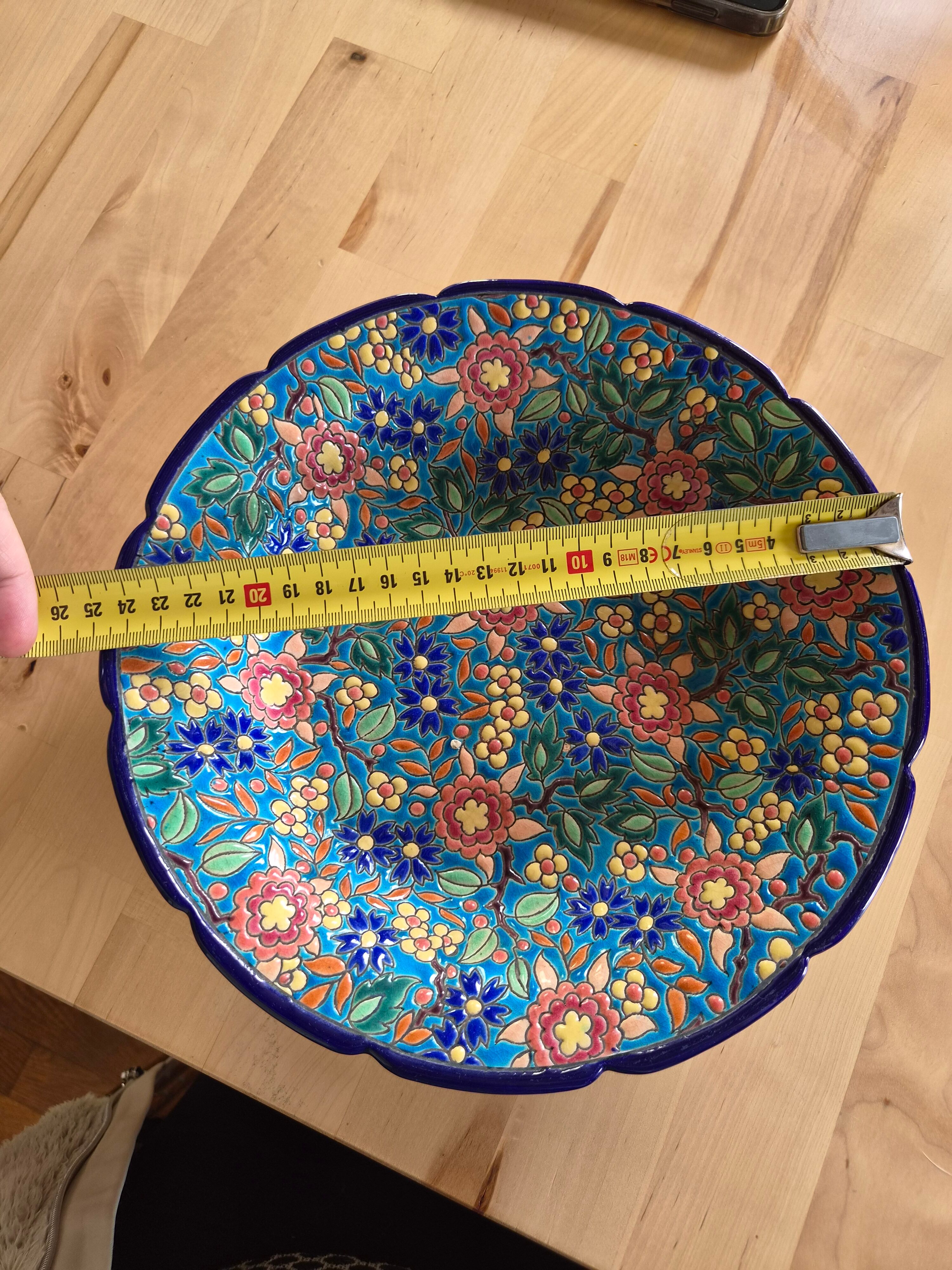 Plate in Émaux de Longwy with no cracks or chips.
