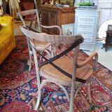 Angled wooden armchairs