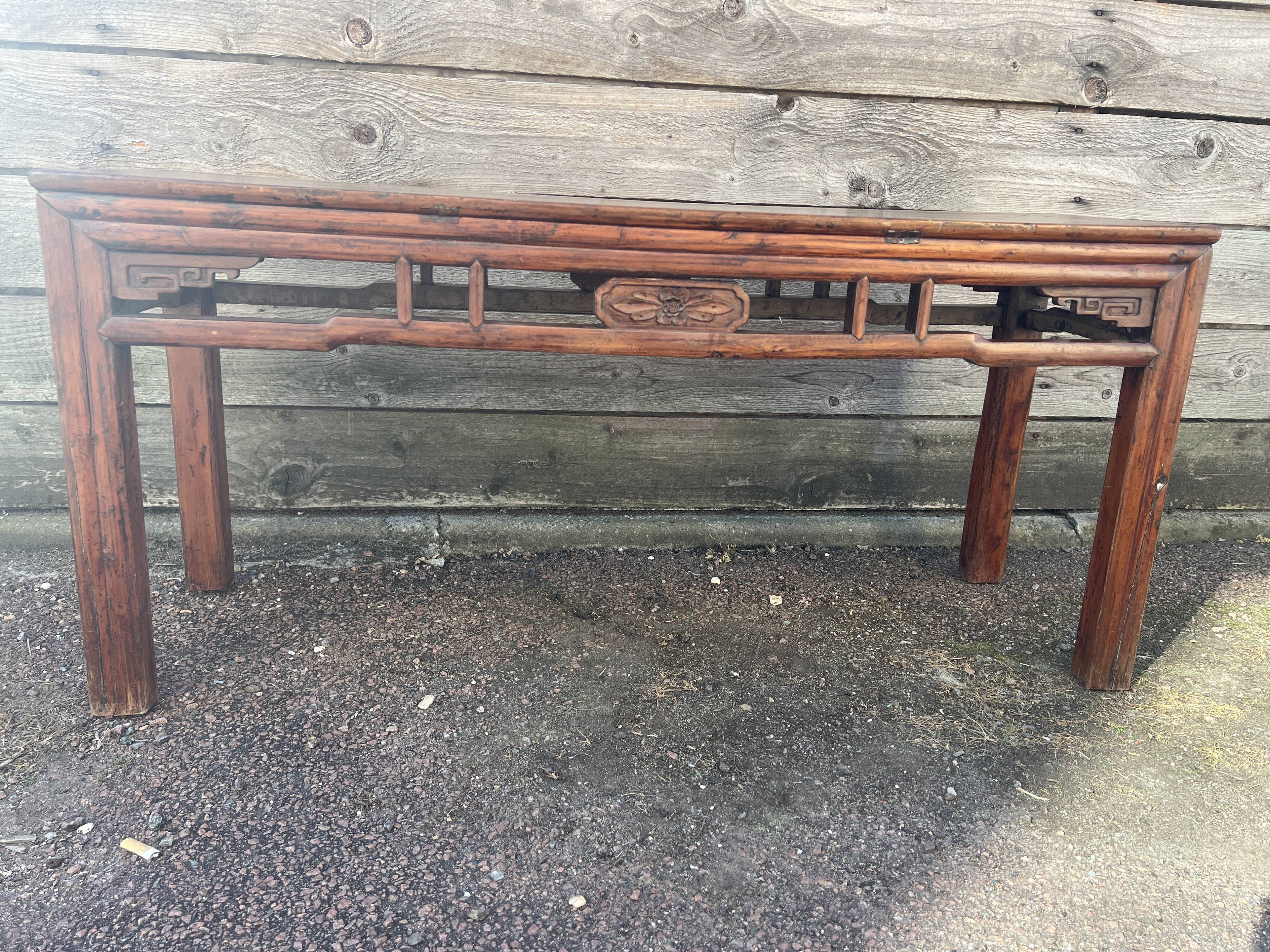 Asian low console in natural wood