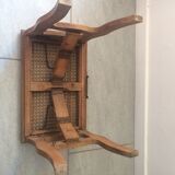 Folding stool in old caning