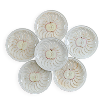 Vintage earthenware plates with a trompe l'oeil apple tart design