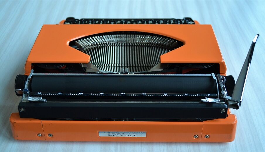 Machine à écrire Silverette orange vintage 60