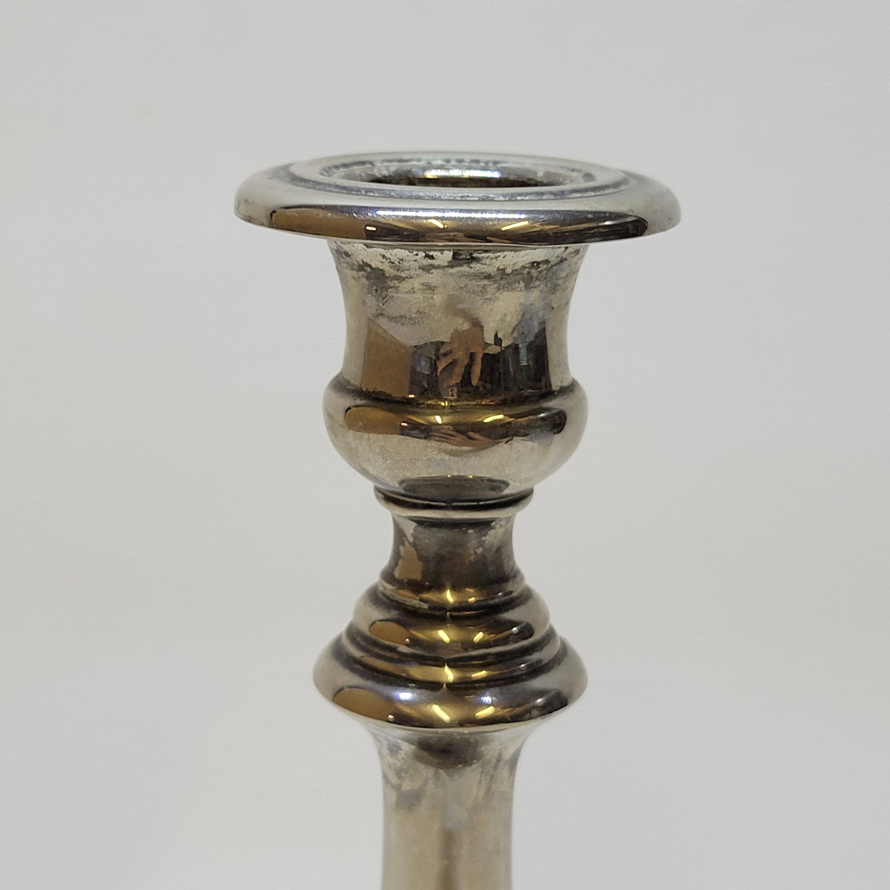 Old candle holder in silver metal
