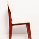 Beech wood armchair in cherry colour with cream boucle fabric - 20th century, Europe, 1960.