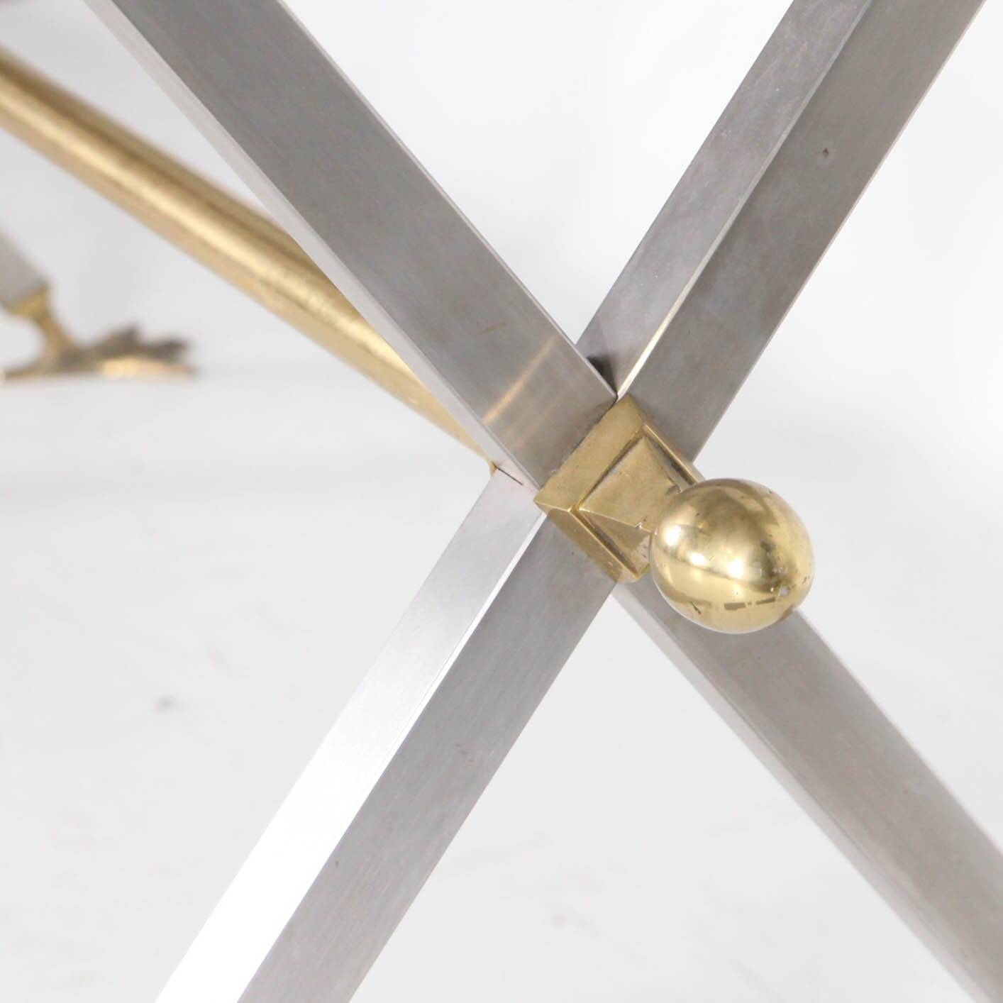 Stainless steel and brass table