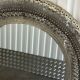Large oriental mirror in pierced metal - H 116 cm