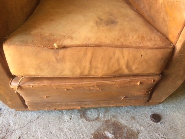 Old leather club armchair
