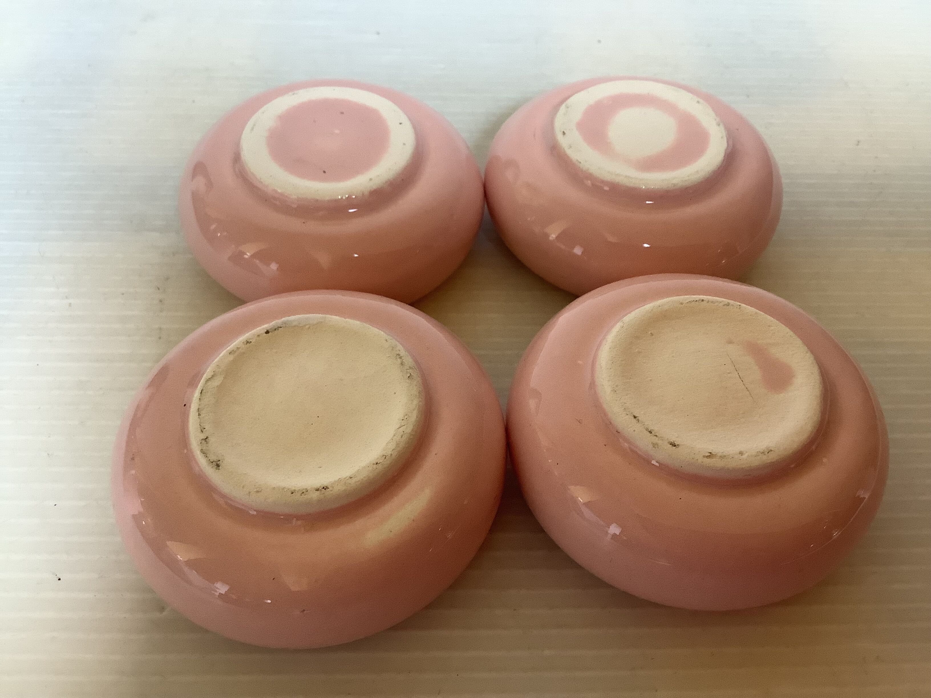Four double pink candlesticks