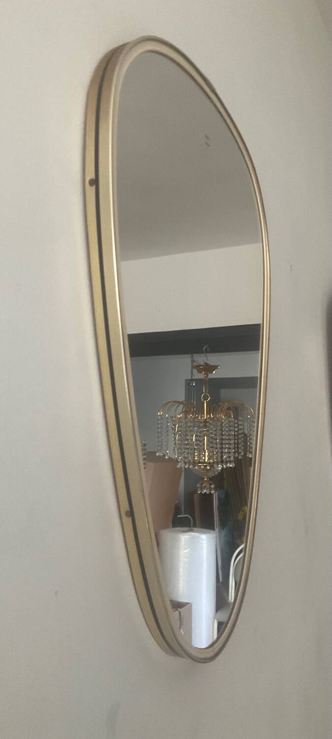 Asymmetrical free-form mirror from the 60s-70s