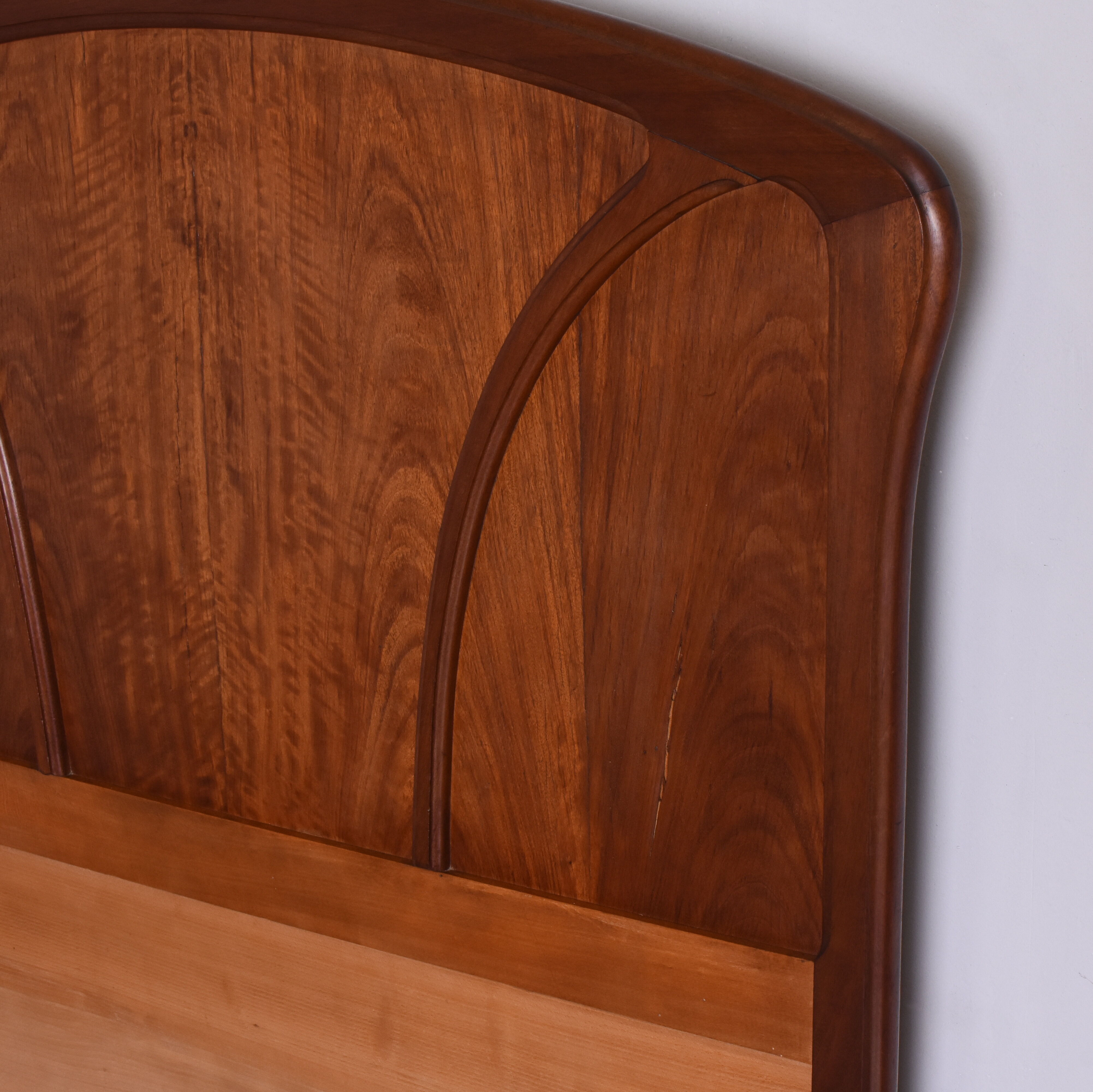 Wooden bed, early 20th century.