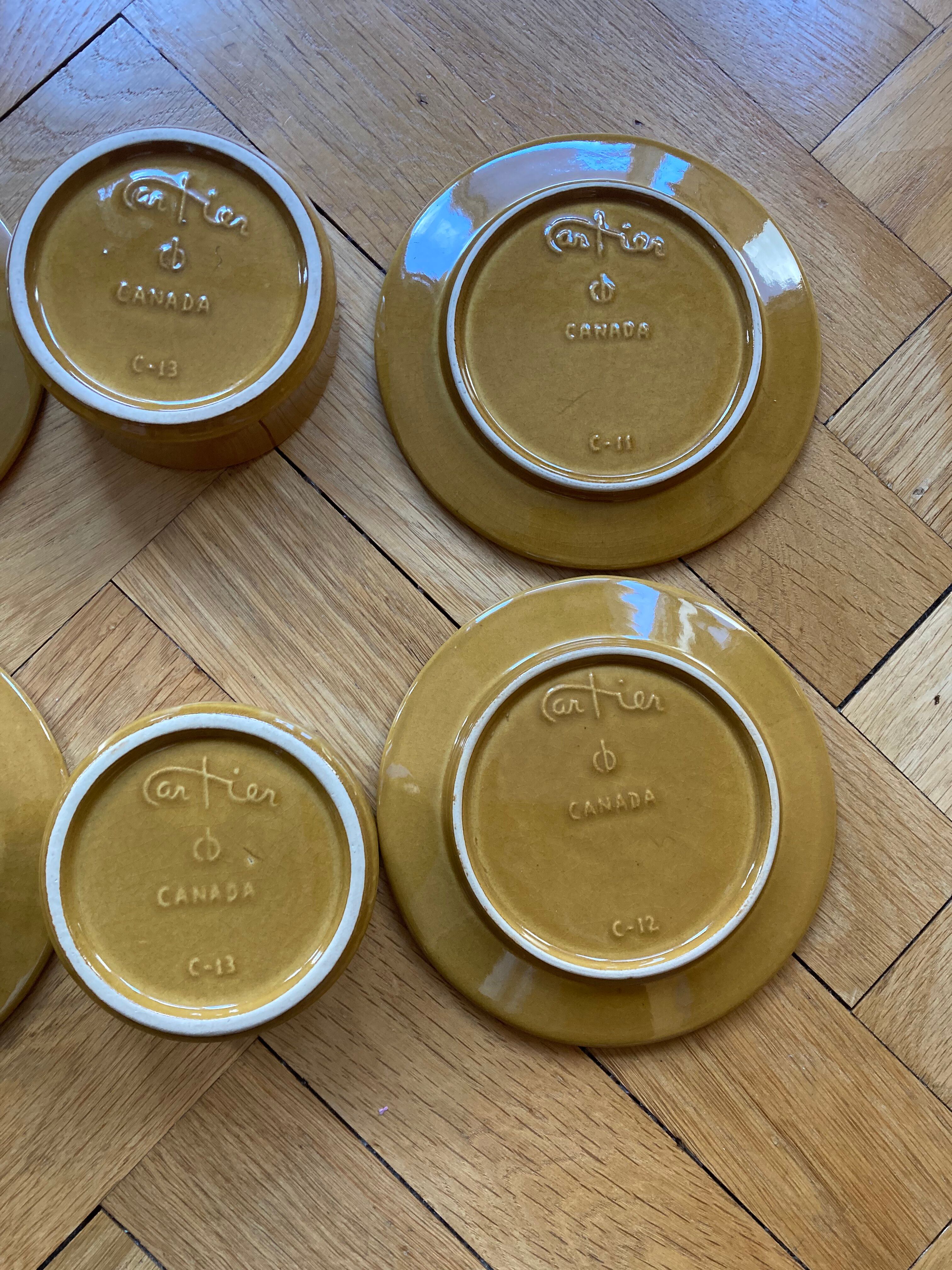 Bowls and ceramic plates from Beauce by Jean Cartier