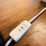 Lamp base representing a die