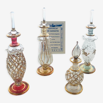 4 Egyptian perfume bottles