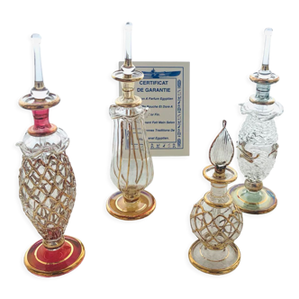 4 Egyptian perfume bottles