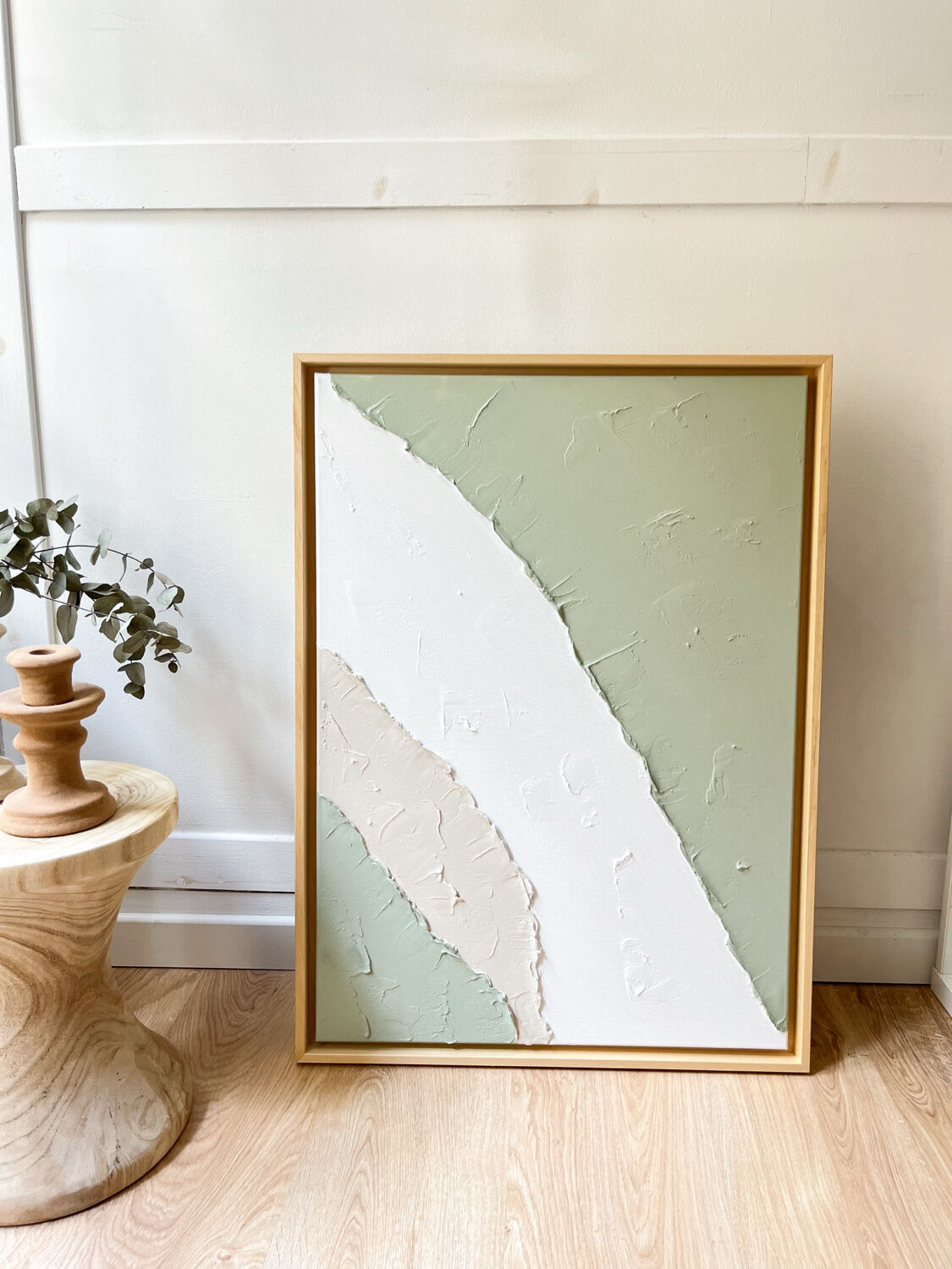 Beige, white, sage green relief table.