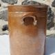 Trio of stoneware pots with lids