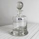Glass carafe with spherical stopper