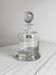 Glass carafe with spherical stopper