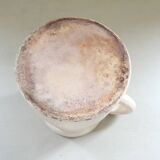 Old earthenware pitcher with its lid