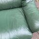 Vintage 2-seater sofa in green leather and solid wood