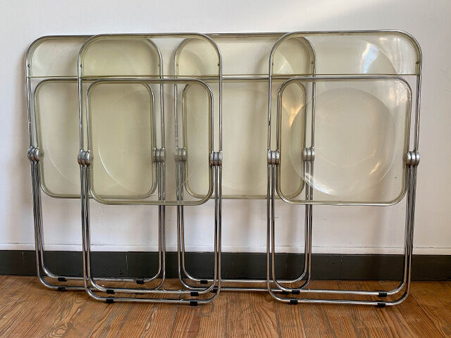 Four Plia folding chairs by Giancarlo Piretti edited by Castelli