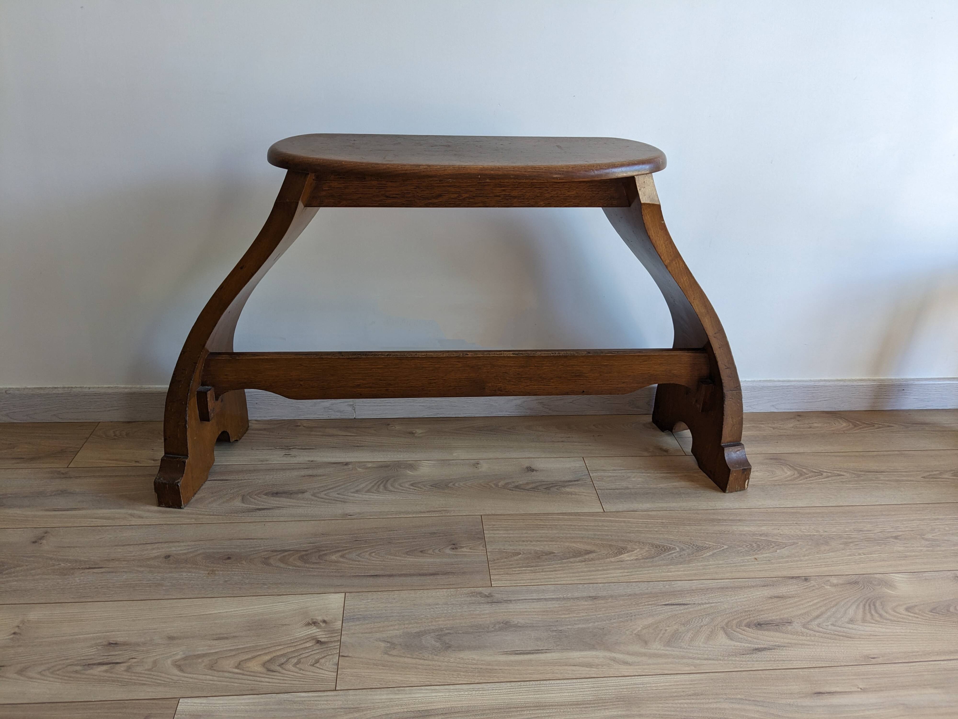Old church organ bench in Art Nouveau style made of solid oak.