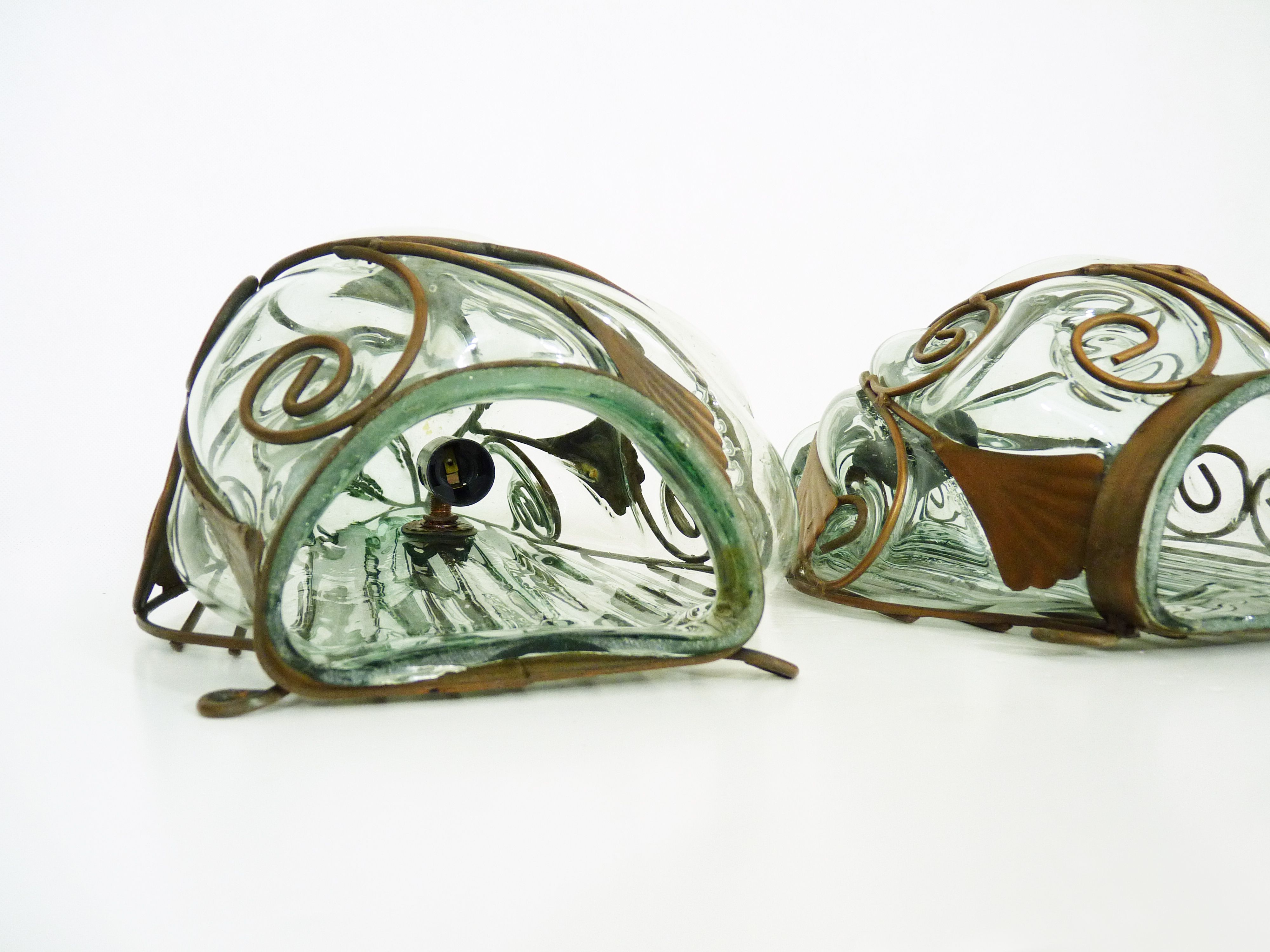 Pair of wall light cage in blown glass green color and wrought iron. Murano style. Year 80