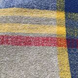 Light gray rectangle tablecloth with blue red yellow tiles