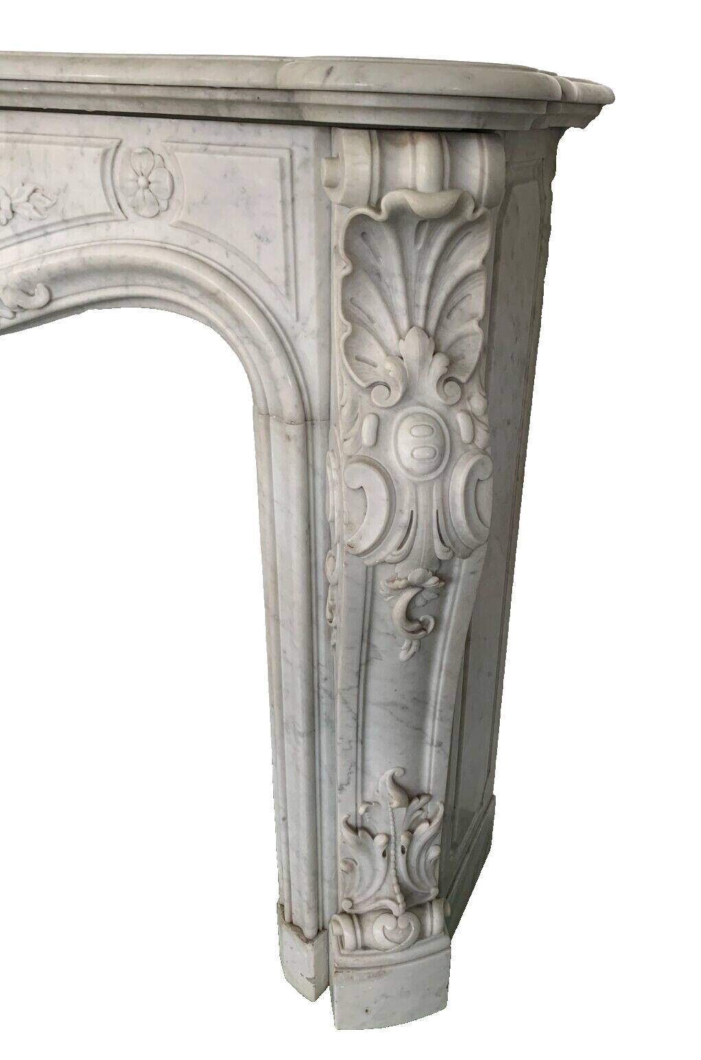 Louis XV style fireplace in white Carrara marble 19th century