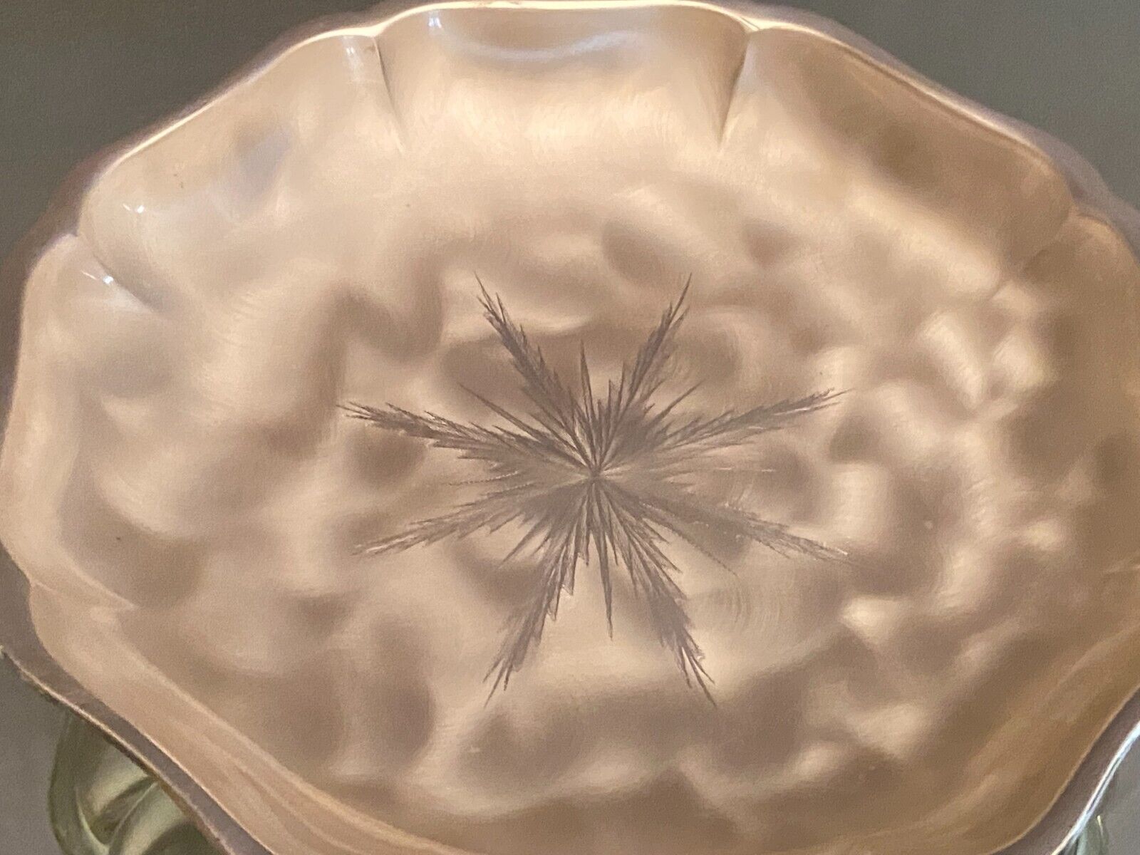 Metal dish with starry decoration