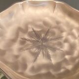 Metal dish with starry decoration