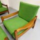 Living room sofa and Scandinavian design armchairs from the 1960s in green boucle.