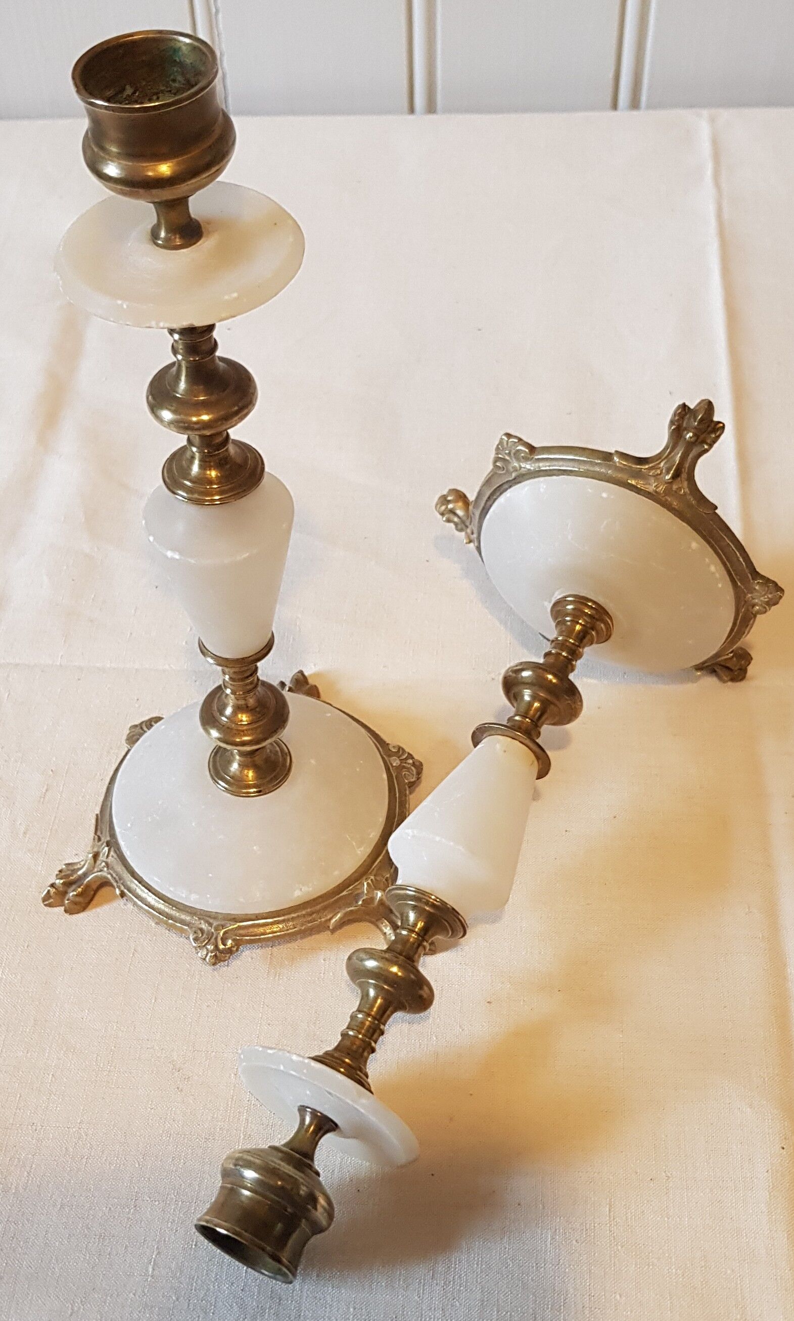 Pair of brass and alabaster candlesticks