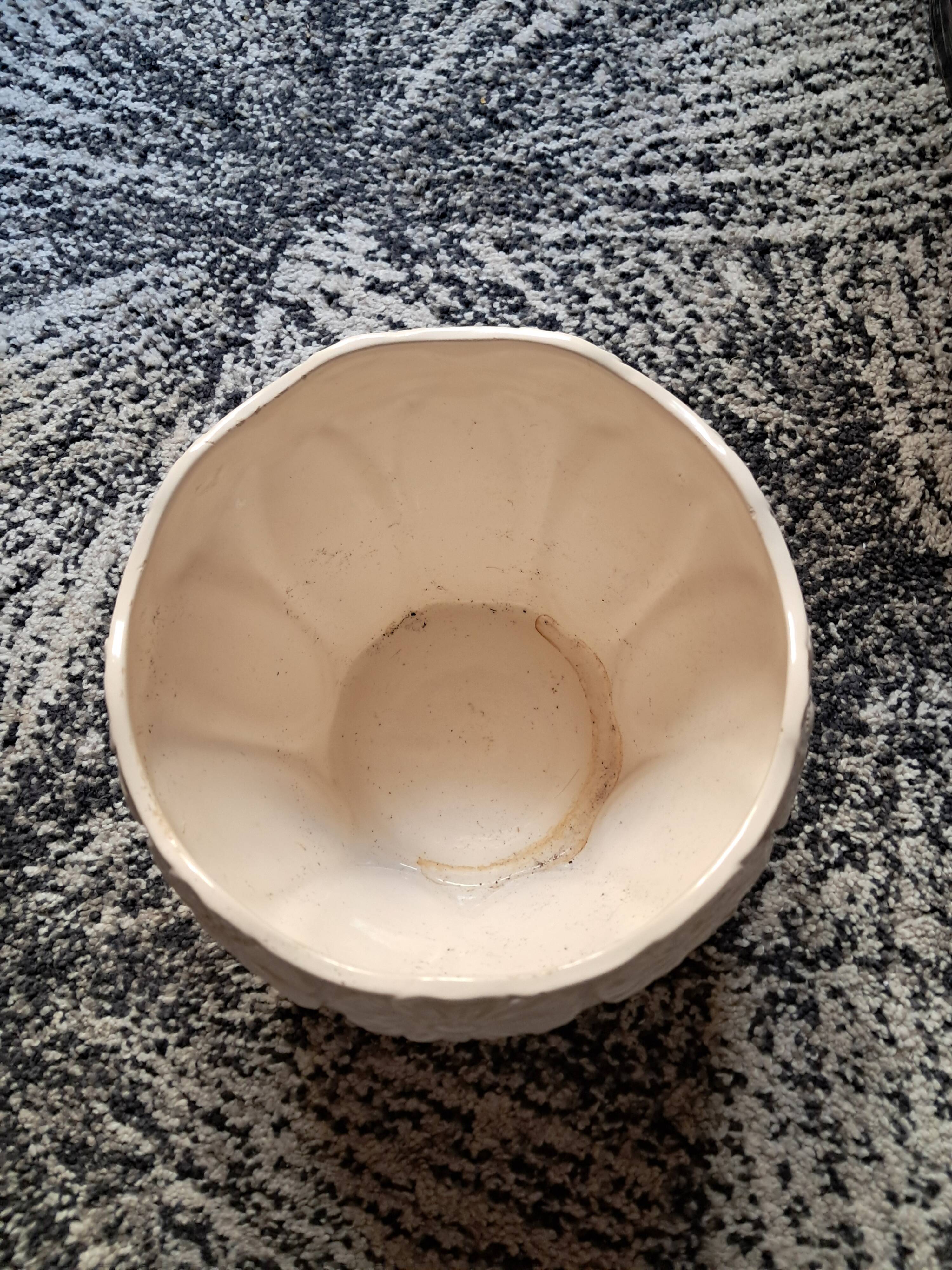 Vintage Art Nouveau ceramic with floral decoration.