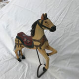 Wooden horse with period ironwork support