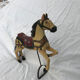 Wooden horse with period ironwork support