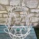 Wrought iron plant holder from the 1950s