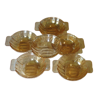 6 scallop dishes with ears from Amora in pink glass in good condition.