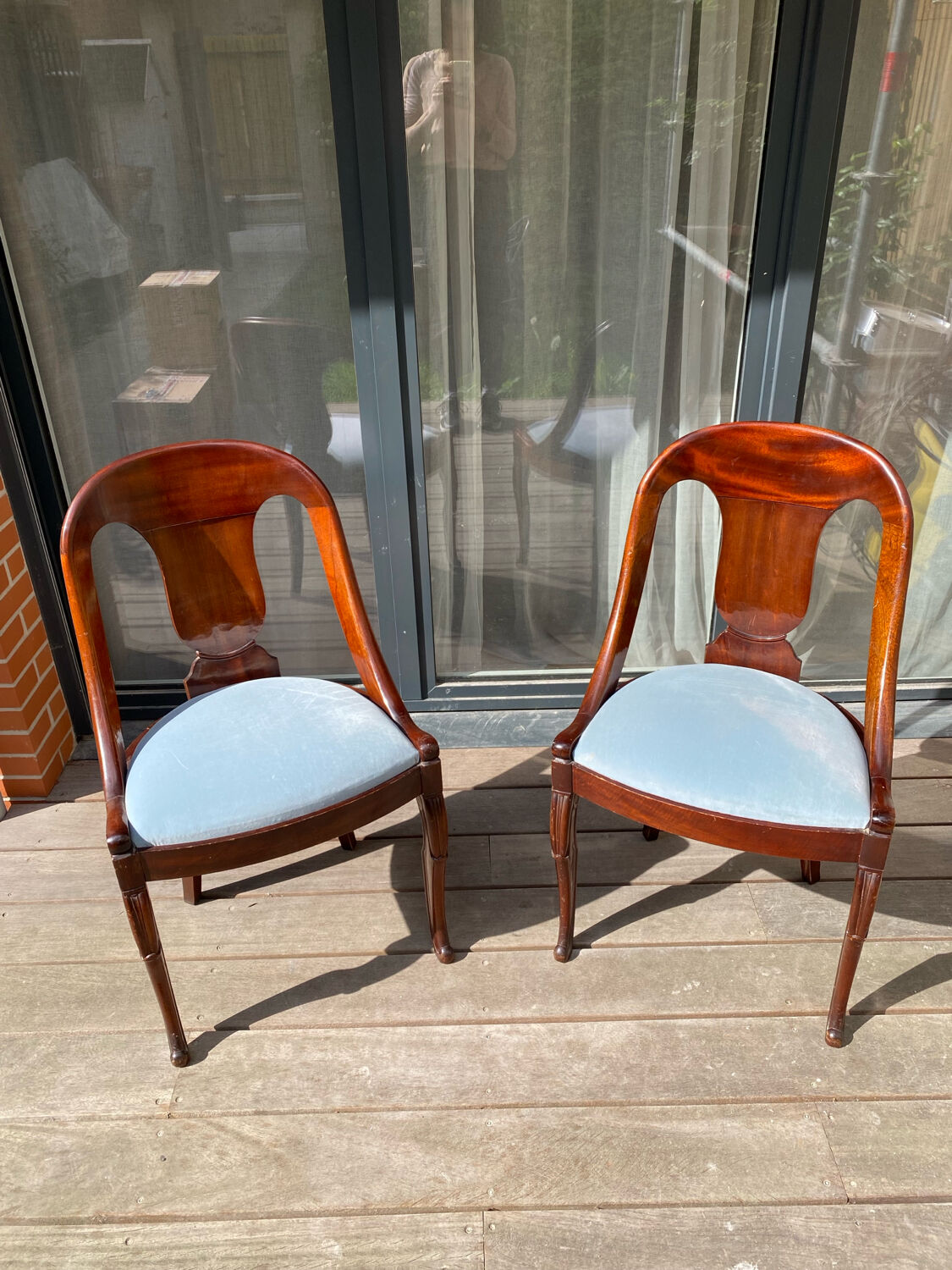 Pair of mahogany gondola chairs